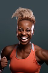 Poster - A woman wearing an orange tank top smiles with joy. This image can be used to depict happiness and positivity in various contexts