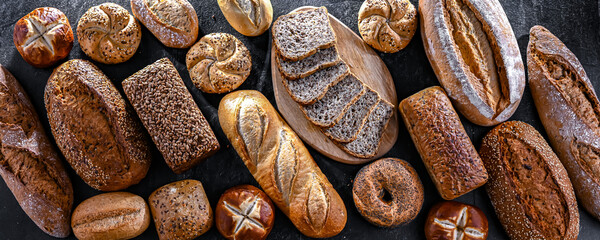 Wall Mural - Assorted bakery products including loaves of bread and rolls