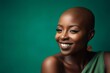African-American woman with a shaved head smiling while wearing a green dress, AI-generated