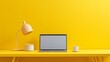 a laptop on a yellow desk
