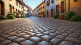 Fototapeta Uliczki - an empty cobblestone street in the middle of an old european town