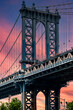 The Manhattan Bridge at sunrise or sunset is a suspension bridge across the East River in New York City, connecting Lower Manhattan to Brooklyn, Long Island (USA).