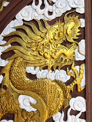 Wall Mural - thai dragon statue on the temple door