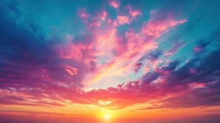 Wall Mural - The dramatic, colorful sky at sunrise creates a scenic backdrop.
