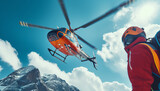 Red Medical Rescue helicopter landing in high altitude Himalayas mountains. High Himalayas expedition during mount climbing. Travel, active people, safety and Traveling insurance concept image.