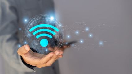 Wall Mural - business using smartphone with wifi icon,business communication concept