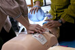 Emergency and first aid class on cpr doll, Cardiac life support