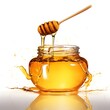 © kittima - honey dripping from a glass jar isolated on white background