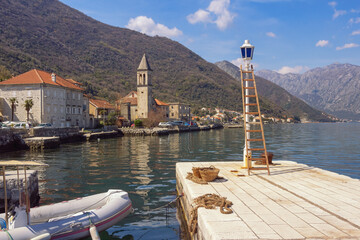 Wall Mural - Beautiful Mediterranean landscape on sunny spring day. Montenegro, Adriatic Sea. View of Kotor Bay and Stoliv town