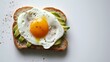 Avocado toast with egg on white background