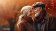 © Bulder Creative - A happy elderly couple in the park on a sunny fall day