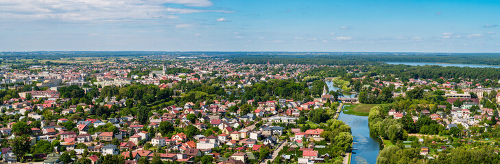 Poster - Augustow city by Netta river and Necko lake aerial landscape under blue sky