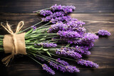 Fototapeta Lawenda - Bouquet of lavender on a wooden table