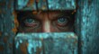 Through a closeup view of a man's face peeking through a hole in a wooden wall, his piercing eyes reveal the depths of his inner self, a mysterious and enigmatic portrait of a human organ longing to 