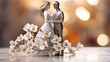 Miniature bride and groom sculpture with orchids against bokeh lights. Concept of wedding ceremony, couple unity, and floral arrangement.