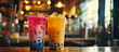The delicious fresh flavors of bubble tea served at a local restaurant , tea and fruit infused. Room for text or copy space advertisement