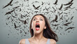 Woman yelling with birds bursting out of her mouth