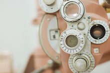 Closeup Vintage Pink Optometer (phoropter)	
