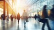 © Dara - Blurred background of a modern shopping mall with some shoppers. Shoppers walking at shopping center,