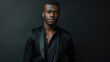 © Nurul - Portrait of a black men. Posing for a fashion shoot.  Isolated in dark background.