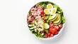 Healthy salad with quail eggs, avocado, cherry tomatoes and pecan nuts on white background