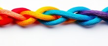 Colorful Ropes Braided Together On White Background. Symbol Of Unity, Diversity, And Teamwork.