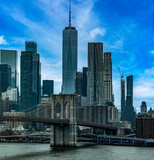 Fototapeta Miasta - The Brooklyn Bridge connects the boroughs of Manhattan and Brooklyn in New York City (USA), this bridge is one of the most famous and well known in the Big Apple.