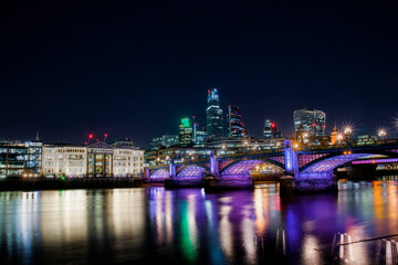 Wall Mural - Southwark Bridge Crossing the River Thames in London, Linking the Districts of Southwark and City of London, Lit up at Night