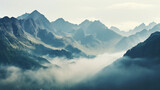 Fototapeta Góry - Mountains under mist in the morning