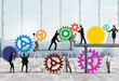 © alphaspirit - Teamwork of businesspeople work together to a system of gears as integration concept