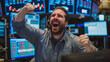 A Trader Celebrating with a Fist Pump on a  Trading Floor with Monitors Showing Positive Stock Trends