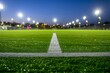 Lush soccer field under bright stadium lights, white line marking, evening game setting. Stadium illuminated for night soccer match, vivid green turf, line in focus, ready for play.
