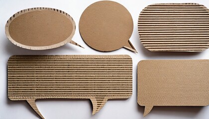 set of blank cut out paper corrugated cardboard speech bubbles of rectangular and round shape with copy space for text on or white background