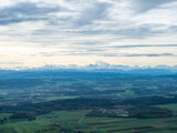 Fototapeta Na ścianę - Roggenflue, Switzerland - October 29th 2023: View from the Jura mountains towards the Swiss Alps.