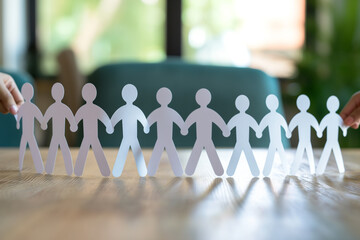 United Team Holding Hands Together,Human Chain Paper on the table in the office