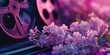 Vintage film reels with pink flowers on a dark surface, creating a romantic atmosphere for a classic movie screening event, a floral-themed film festival, or elegant decor for a vintage cinema lounge.