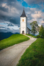 Rural Road And Saint Primoz Church On The Hill, Slovenia