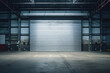 Roller door or roller shutter, concrete floor in industrial building i.e. modern factory, plant, warehouse, shop, garage or store.