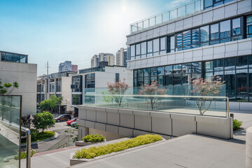 Sticker - Modern urban business building on a sunny day