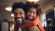 Small cute mixed race kid daughter embrace loving black dad smiling bonding sit on sofa, happy affectionate african american family single father and little child girl hugging enjoy moments of love