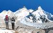 mount Everest Lhotse and Nuptse from Nepal side as seen from Pumori base camp with two hikers, vector illustration, Mt Everest 8,848 m, Khumbu valley, Sagarmatha national park, Nepal Himalaya mountain