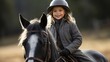 Happy girl riding horse, wearing horseriding helmet for equitation lesson, looking at camera