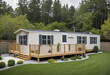 © Random_Mentalist - A recently built mobile home located within a community specifically designed for retired individuals.