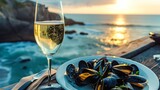 Fototapeta  - Restaurant dinner with mussels dish and champagne glass on sea resort wallpaper background
