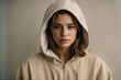 © Centric  - Portrait of a young girl with a peach colored hoddie