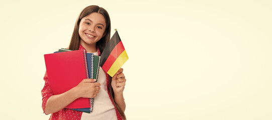 Sticker - happy kid hold german flag and school copybook for studying isolated on white, foreign language. Banner of school girl student. Schoolgirl pupil portrait with copy space.