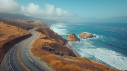 Wall Mural - A scenic coastal drive, with winding roads hugging dramatic cliffs and offering sweeping ocean views