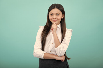 Sticker - Beautiful teenager child over isolated yellow background with hand on chin thinking about question, thoughtful face. Doubt concept.