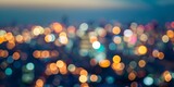 Fototapeta Miasto - A colorful, blurry cityscape at night with a bokeh effect.