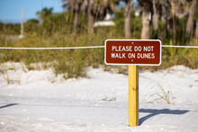 Do Not Walk On Sand Dunes Sign On White Sandy Florida Beach. Keep Off Signage On Gulf Coast Shoreline Dune Conservation Area.